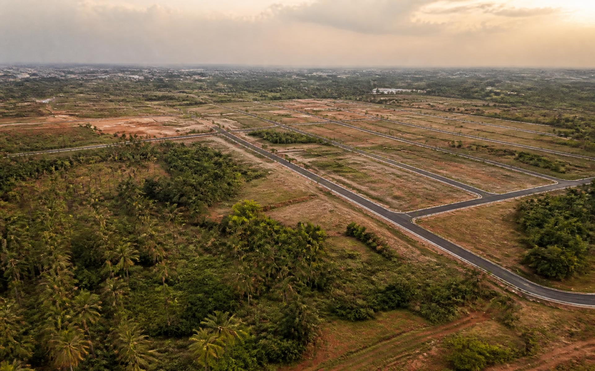 Aerial view of plotted land and new roads on the outskirts of Hyderabad